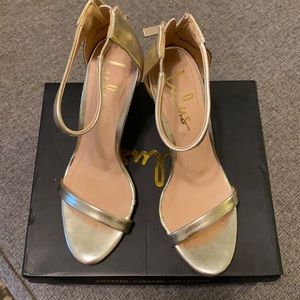 Lulu’s gold high heels